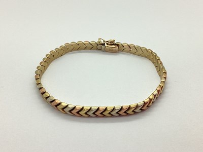 Lot 72 - A Three Colour Bracelet, of chevron design, to...