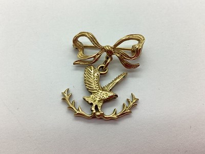 Lot 65 - A 9ct Gold Eagle Charm Pendant, suspended on...