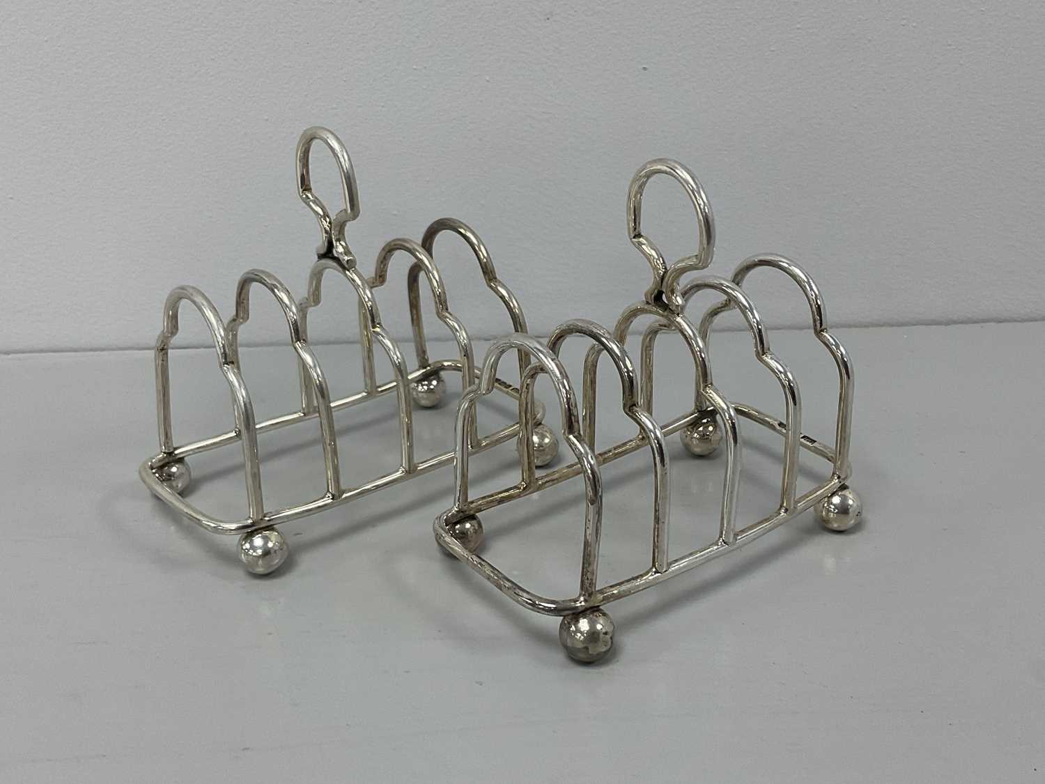 Lot 10 - A Pair of Hallmarked Silver Five Bar Toast...