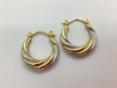 Lot 76 - A Pair of Two-Tone Creole Hoop Earrings, of...