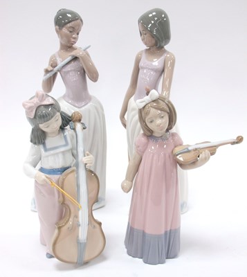 Lot 1210 - A Collection of Nao Figurines with a Musical...