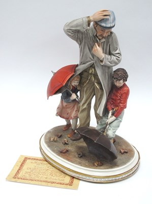 Lot 1178 - A Capo di Monte Figure Group 'Wind and Rain'....