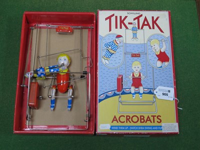 Lot 905 - A late 20th Century tinplate wind up Tik-Tak...