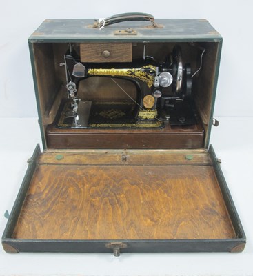 Lot 1111 - Singer Sewing Machine.