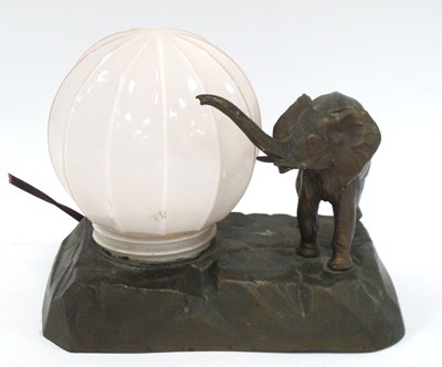 Lot 1325 - Bronzed Spelter Table Lamp with pink glass...