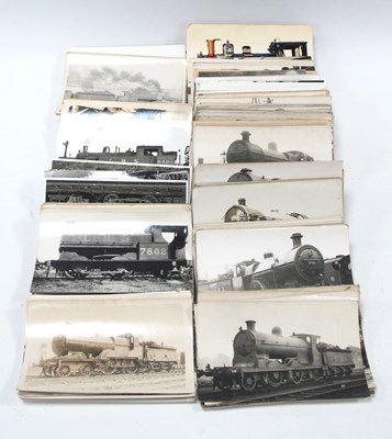 Lot 1381 - A Collection of Black and White Postcards of...