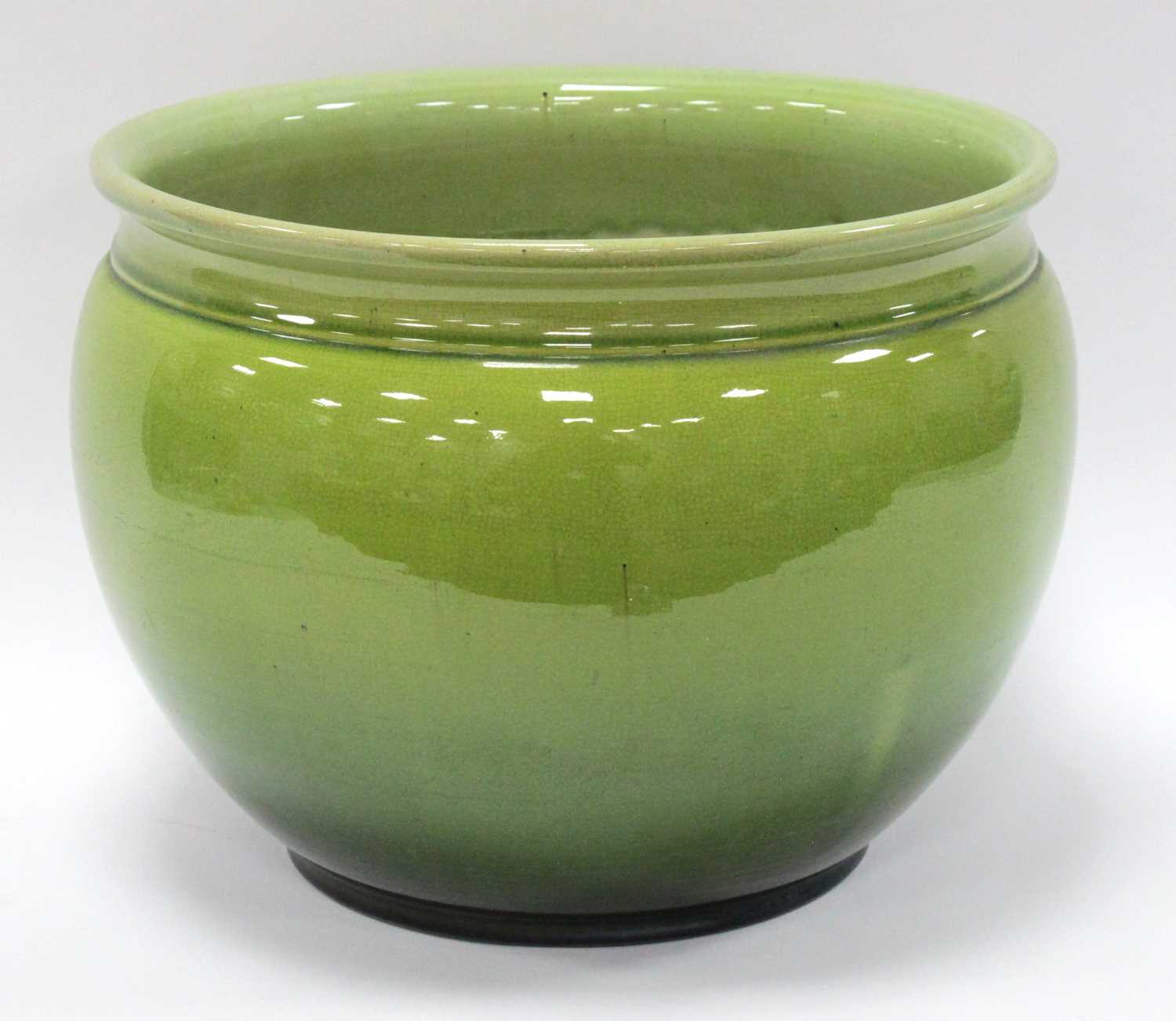Lot 1398 - Bretby, Green Pottery Jardiniere, 29.5cm wide.