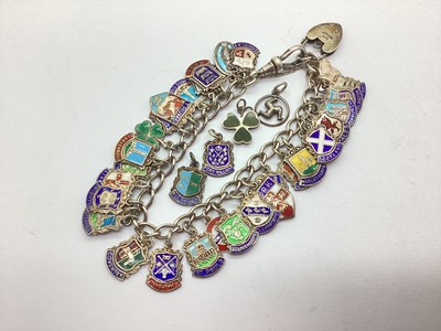 Lot 116 - A Hallmarked Silver Curb Link Charm Bracelet,...