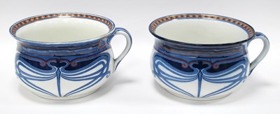 Lot 1395 - Royal Doulton 'Aubrey', a pair of chamber pots,...