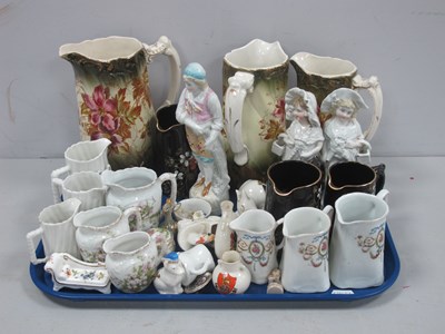 Lot 1088 - Late XIX Century Set of Three Graduated Jugs,...