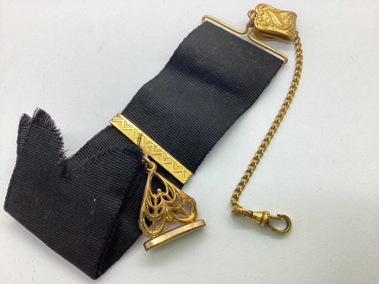 Lot 302 - A Victorian Black Watch Ribbon, suspending...