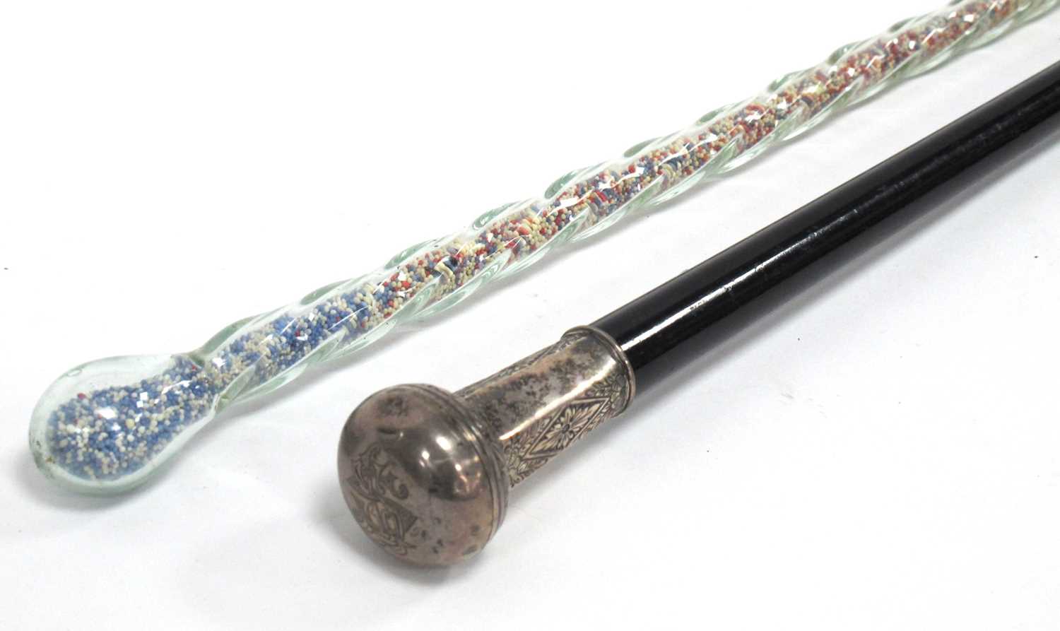 Lot 1254 - A Late XIX Century Clear Glass Walking Cane,...