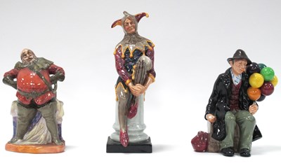 Lot 1238 - Royal Doulton Figurines 'The Jester' (chipped),...