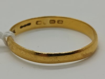 Lot 61 - A Plain Wedding Band, (hallmark carat rubbed),...