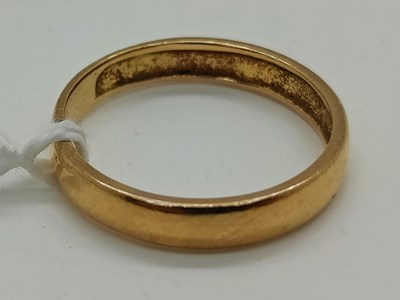 Lot 50 - A 22ct Gold Plain Wedding Band, (finger size...