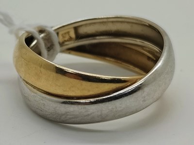 Lot 57 - A Two-Tone Crossover Ring, stamped "585"...