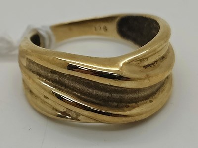 Lot 64 - An Abstract Style Crossover Ring, of partial...