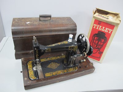 Lot 1064 - Strata Sewing Machine, Tilley storm lamp (2).