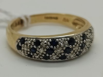 Lot 63 - A 9ct Gold Diamond and Sapphire Dress Ring,...