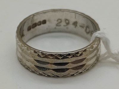 Lot 52 - An 18ct White Gold Wide Wedding Band, of...