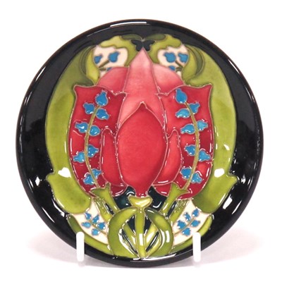 Lot 1206 - A Moorcroft Pottery Coaster, in a trial Art...