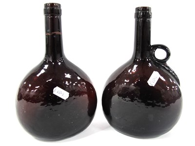 Lot 1010 - An XVIII Century Brown Glass Single Handled...