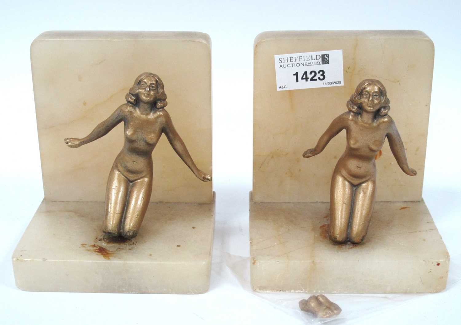 Lot 1423 - A pair of Art Deco Alabaster Bookends, each...