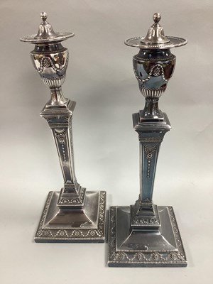 Lot 11 - A Pair of HE&Co Electroplated Candlesticks,...