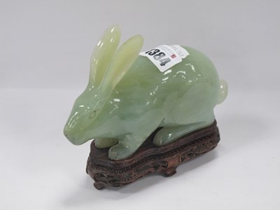 Lot 1384 - Oriental, jade figure of a seated rabbit,...