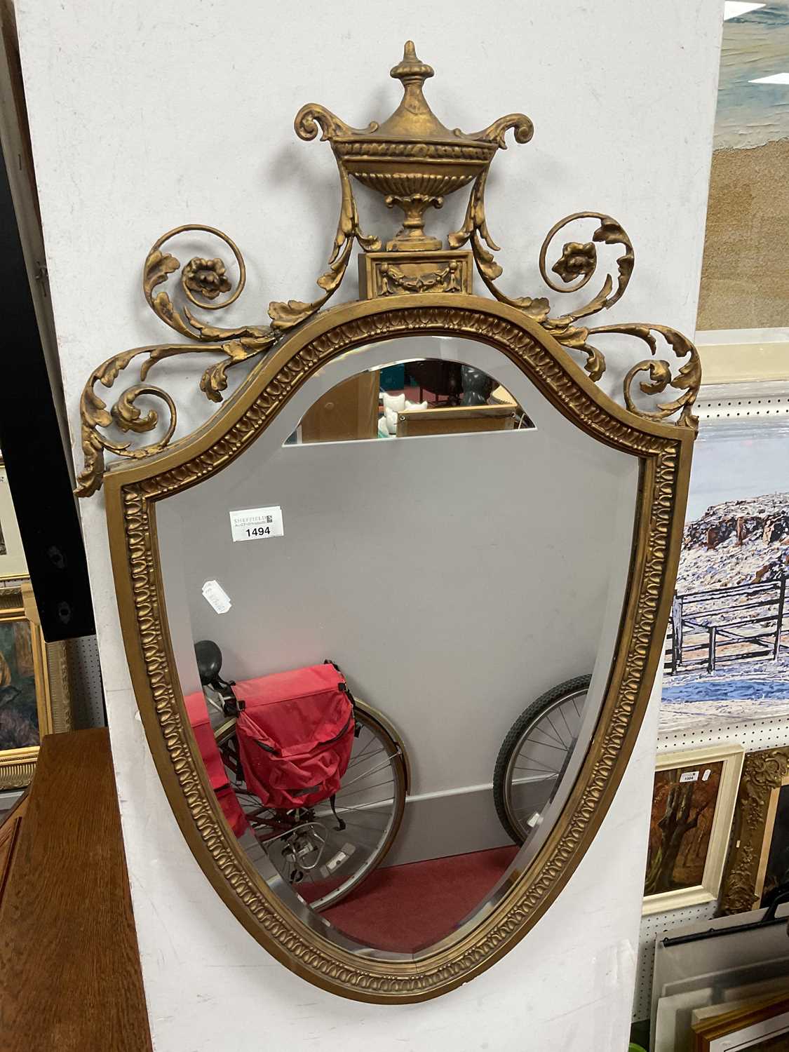 Lot 1494 - Shield-Shaped Beveled Wall Mirror, circa early...