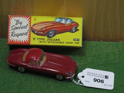 Lot 906 - Corgi Toys; A Boxed 307 E type Jaguar,...