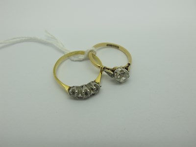 Lot 317 - A Three Stone Diamond Ring, the old cut stones...