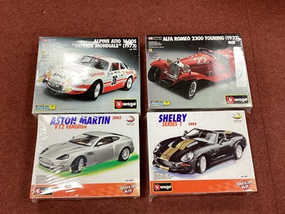Lot 721 - Three Burago 1:18th Scale Metal Car Kits...