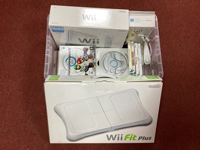 Lot 745 - A Nintendo Wii Gaming Console, Wii Wheel,...