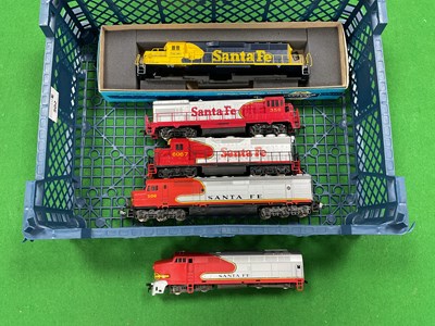 Lot 502 - Four HO scale Santa Fe locomotives: a Lima E8...