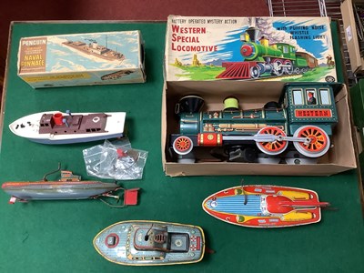Lot 617 - A Boxed Battery Operated Tinplate Western...