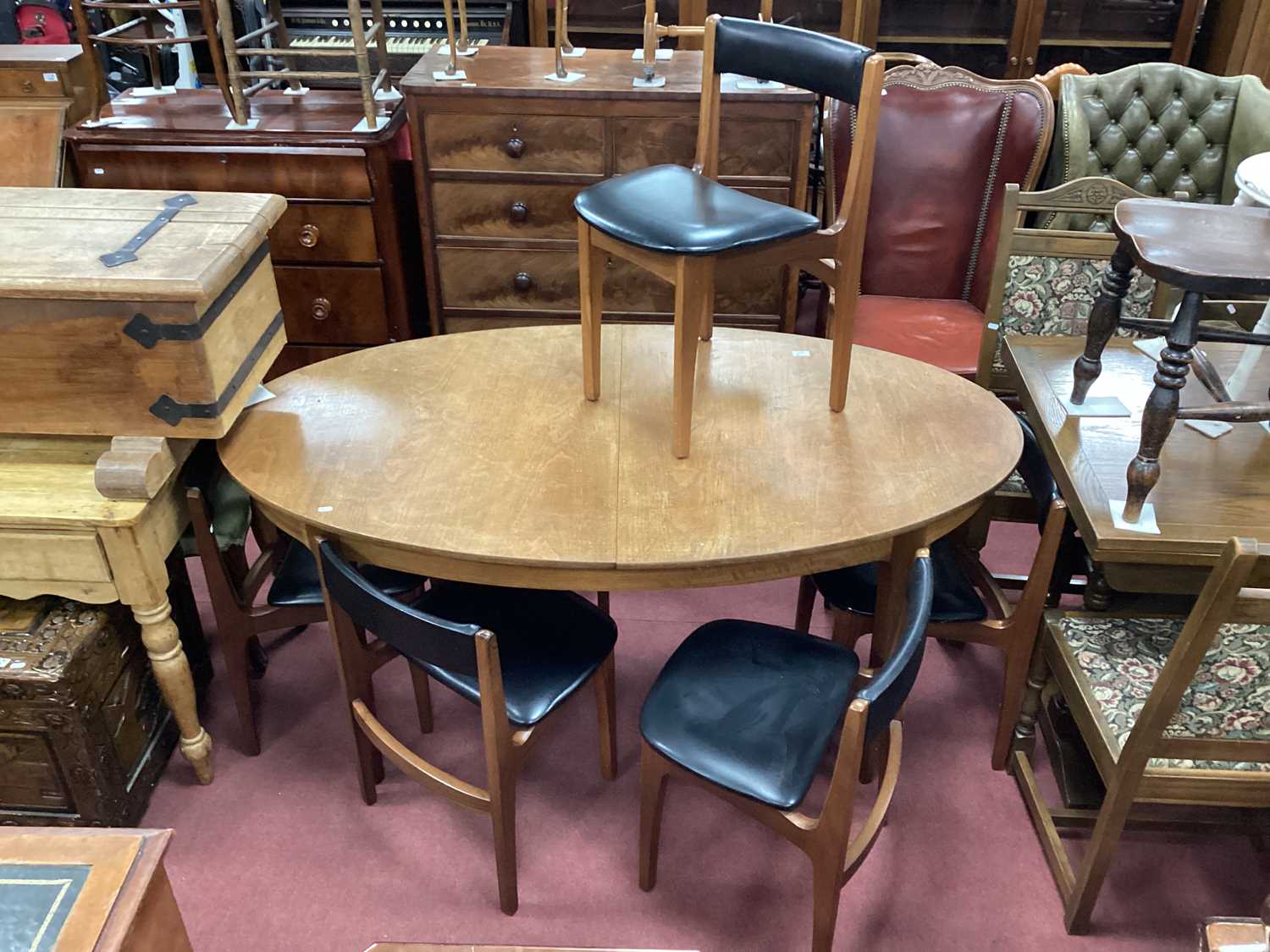 Lot 1555 - Sutcliffe of Todmorden Teak Extending Dining...