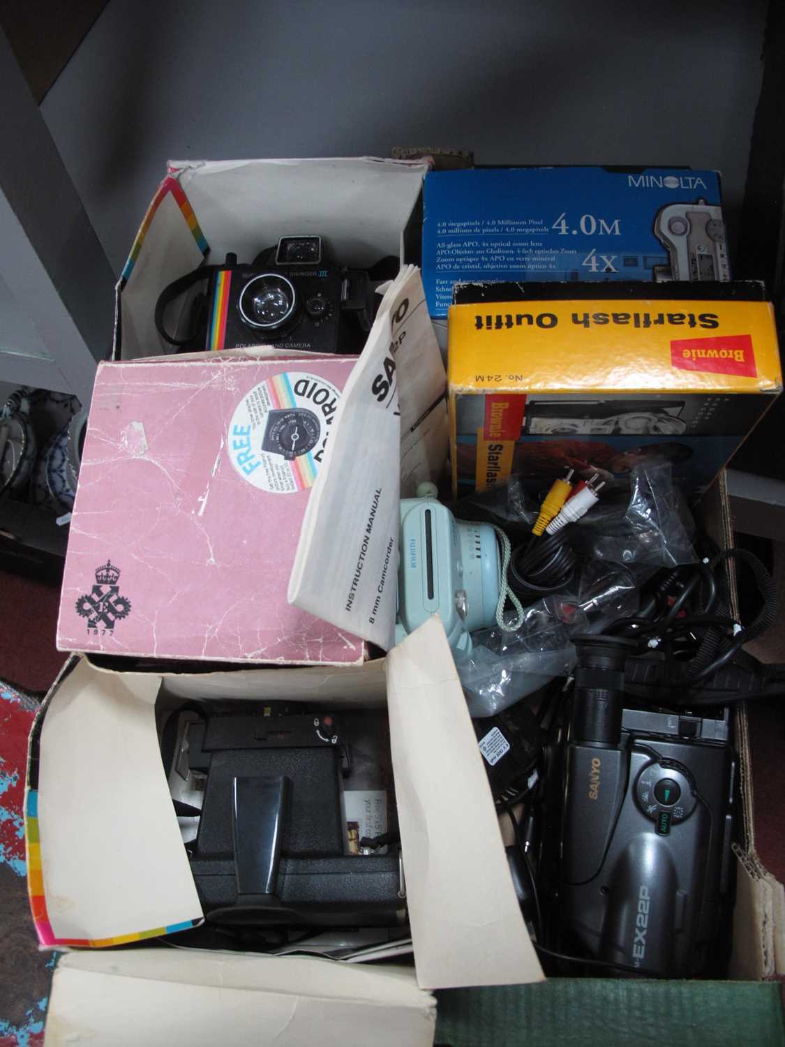 Lot 1016 - Cameras; A collection of Polaroid cameras to...