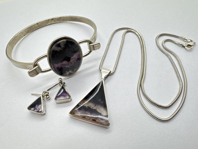 Lot 170 - A Blue John Pendant, triangular collet set,...