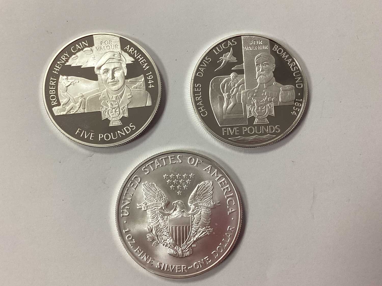 Lot 636 - Three Silver Coins, includes a Guernsey 2006...
