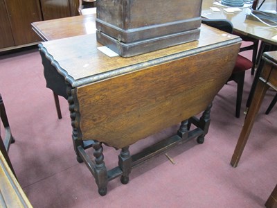 Lot 1639 - 1930's Oak Gate Leg table, with scalloped edge,...