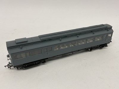 Lot 865 - A boxed 00 gauge NER railcar in workshop grey,...