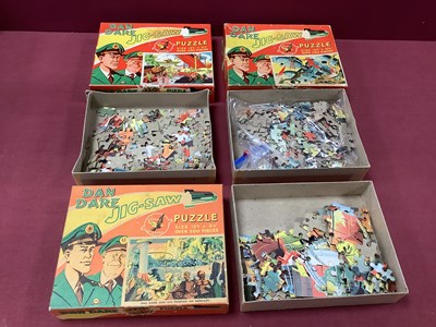 Lot 895 - Three 1950s Eagle Dan Dare Card Jigsaw Puzzles,...