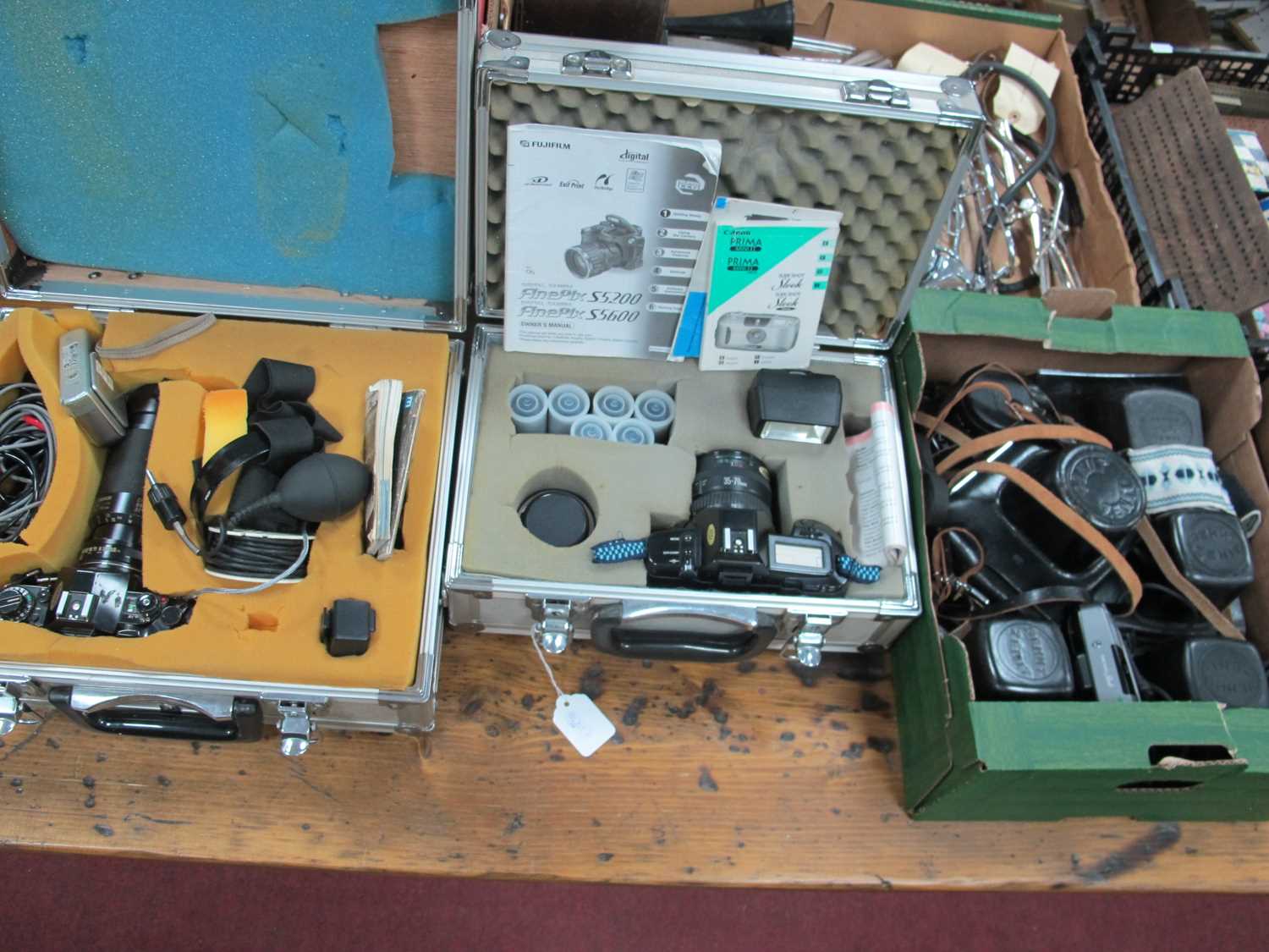 Lot 1023 - Cameras - Canon A-1, E05 650 each with...
