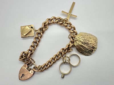 Lot 211 - A 9ct Gold Chunky Curb Link Charm Bracelet,...