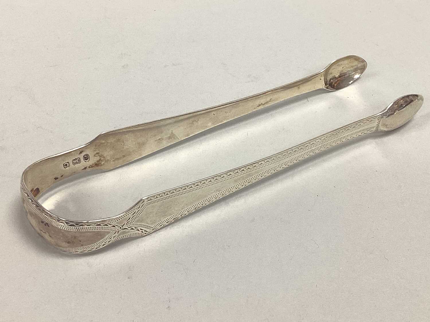 Lot 97 - A Pair of Georgian Hallmarked Silver Sugar...