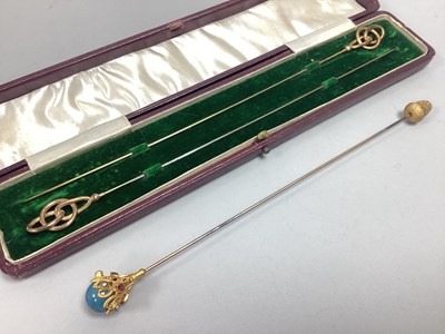Lot 249 - A Gilt Coloured Hat Pin, with sinuous openwork...