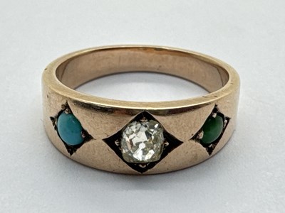 Lot 230 - A 9ct Gold Diamond and Turquoise Three Stone...