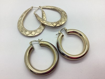 Lot 202 - A Pair of Modern Plain Hoop Earrings, stamped "...