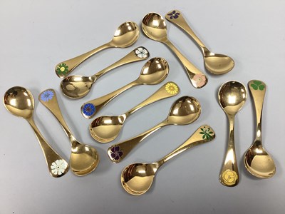 Lot 101 - Georg Jensen; A Set of Twelve Gilt and Enamel...